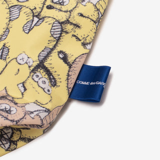 KAWS X CDG SHIRT PATTERN PRINT BAG - YELLOW